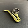 Creative Mini Musical Instrument Keychain Cute Silicone Guitar Piano Saxophone Key Chain Backpack Car Ornament Musician Jewelry