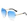 Style Personality Gradual Change Ocean Piece European and American Glasses Cut Edge Sunglasses Women Frameless Metal