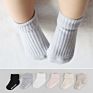 Solid color turn cuff baby booties socks with anti slip