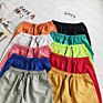 Stock Beach Shorts Polyester Men Running Shorts Mesh Lining Shorts for Men with Letter Printing for Promotion