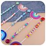 Chewable Rainbow Teether Toy and Silicone Letter Rainbow Dummy Nipple Holder Chain Baby Teething Set