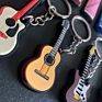 Creative Mini Musical Instrument Keychain Cute Silicone Guitar Piano Saxophone Key Chain Backpack Car Ornament Musician Jewelry