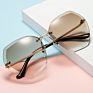 Style Personality Gradual Change Ocean Piece European and American Glasses Cut Edge Sunglasses Women Frameless Metal