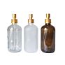 Eco Friendly Cleaning Glass Bottle 250Ml 500Ml Fine Mist Spray Bottle with Gold Nozzle Pump and Silicone Sleeve