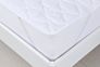 100% Polyester Microfiber Quilted Mattress Pad for Hotel Waterproof Peach Skin Fabric Laminated Tpu Film