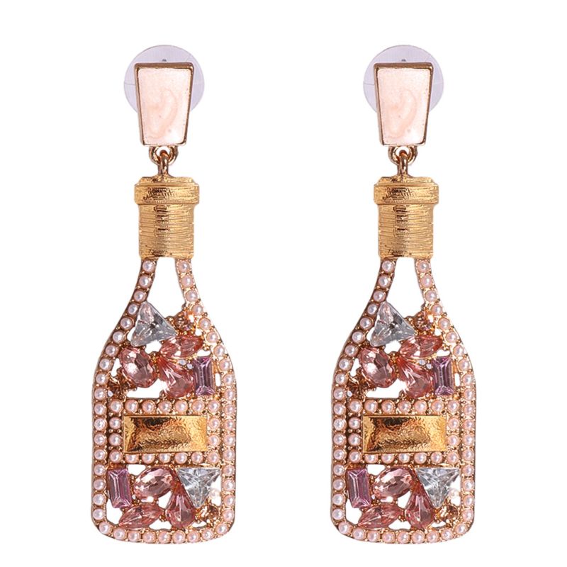 Vintage champagne bottle full of diamond-studded pearl earrings