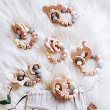 Wholesales Food Grade Silicone Baby Teether Bracelet with Wooden Animal Baby Teething Wood Ball Teether Toy Baby Teether